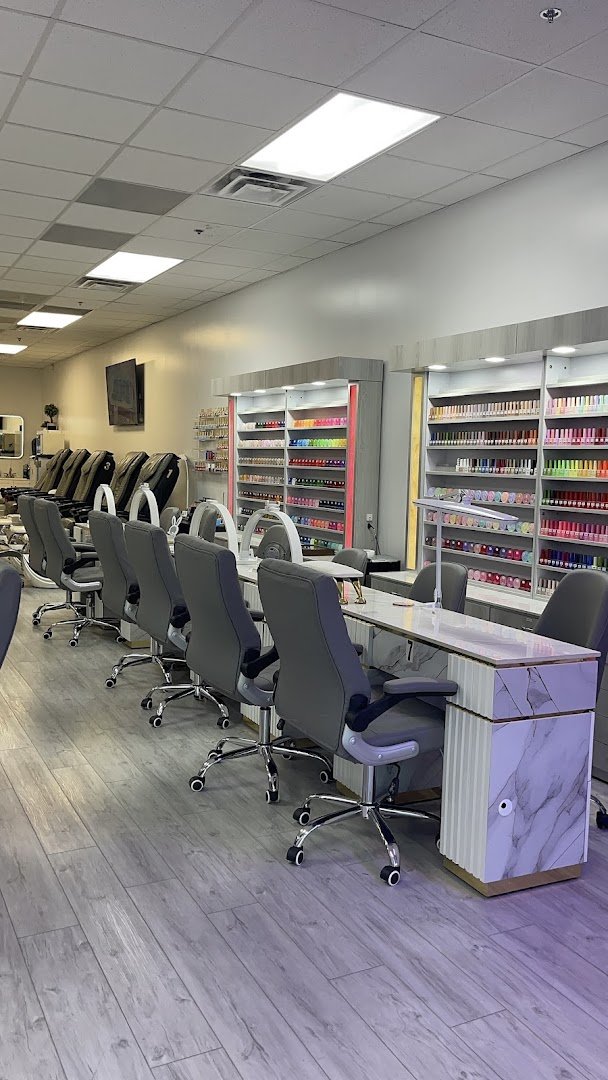 Modern salon interior with polished nail tables.